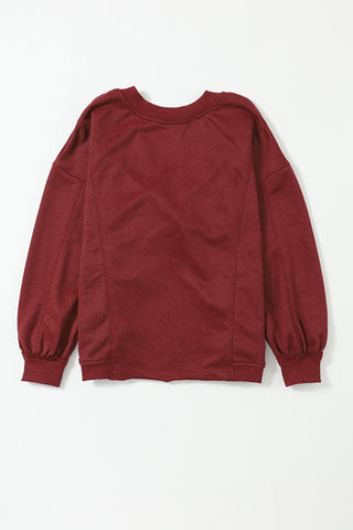 Twisted Round Neck Dropped Shoulder Sweatshirt Divacious