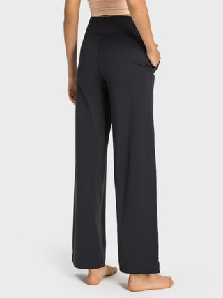 Millennia Drawstring Waist Wide Leg Sports Pants with Pockets Trendsi