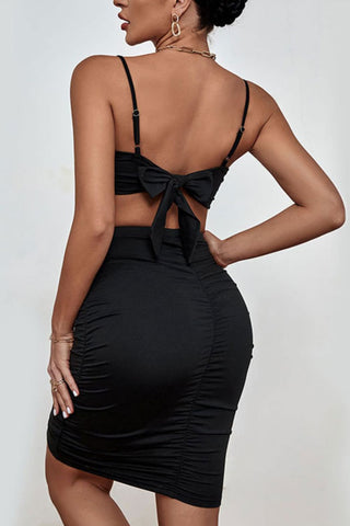 Perfee Spaghetti Strap Cropped Top and Ruched Skirt Set Trendsi