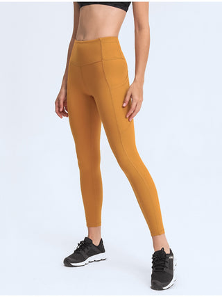 Millennia Wide Waistband Leggings with Pockets Trendsi