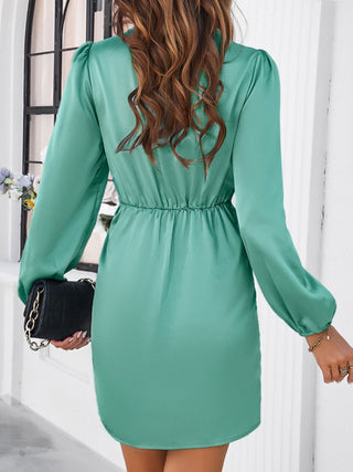 Devine Ruched Surplice Long Sleeve Mini Dress Trendsi