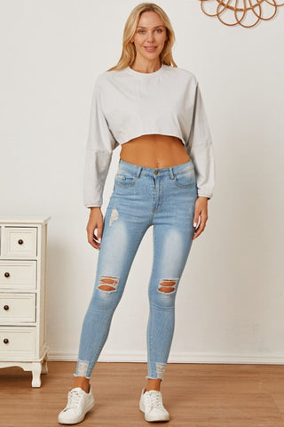 Round Neck Dropped Shoulder Cropped Sweatshirt Divacious